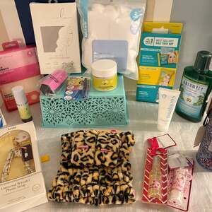 Beauty and Wellness Gift Bundle featuring PanOxyl, Derma E, and Leopard Spa Set